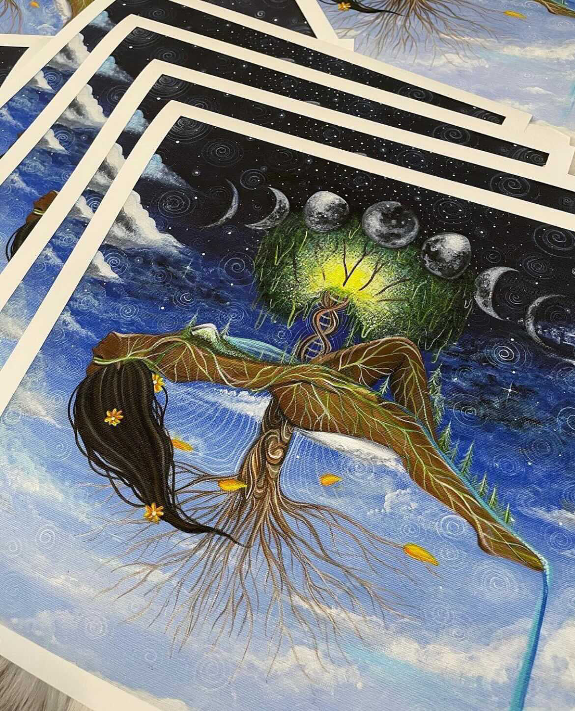 A close up shot of a print of “The Divine Feminine”