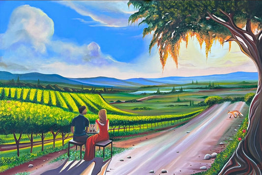 A canvas print of a painting depicting a couple sitting at a table in a vineyard with a view of rolling hills and a clear sky.