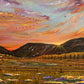 Painting of a landscape with mountains, fields, and a colorful sky.