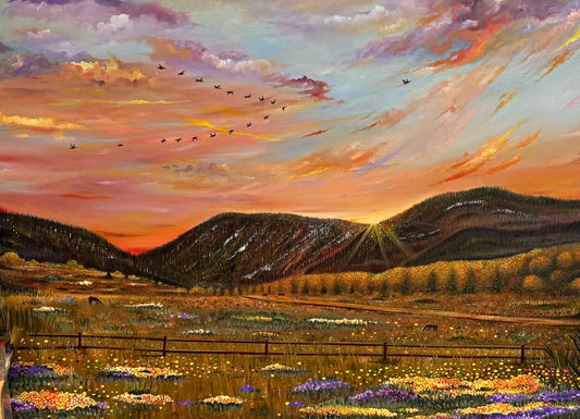 Painting of a landscape with mountains, fields, and a colorful sky.