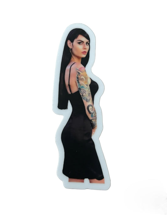 Sticker of a woman in a black dress with tattoos on a white background