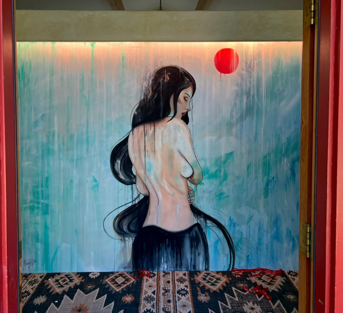 A large watercolor painting of a woman with long hair and a red circle above her head, framed by a colorful red room. 